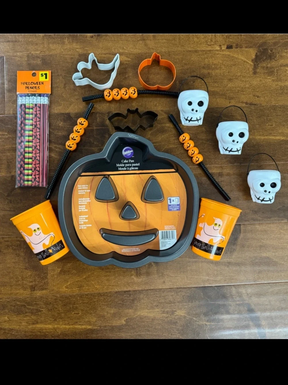 Skeleton costume, Halloween cake pan, cups, straws, cookie cutters & pencils
